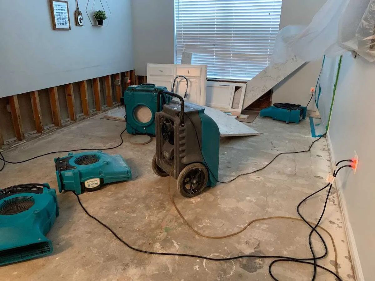 Dehumidifier in flood-cut room for Water Damage Restoration in De Soto